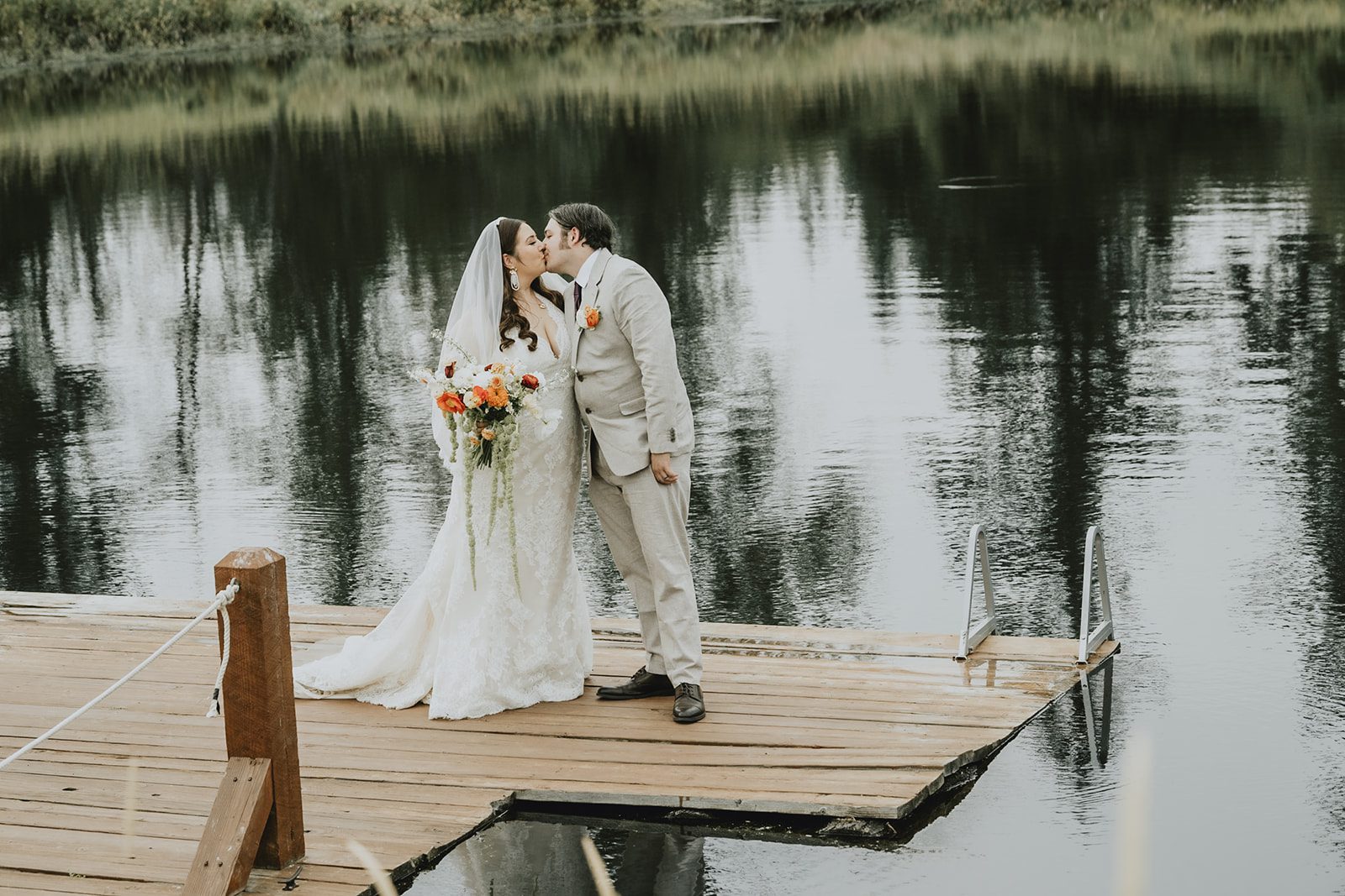 Couple on the dock at Brightwater Weddings & Events