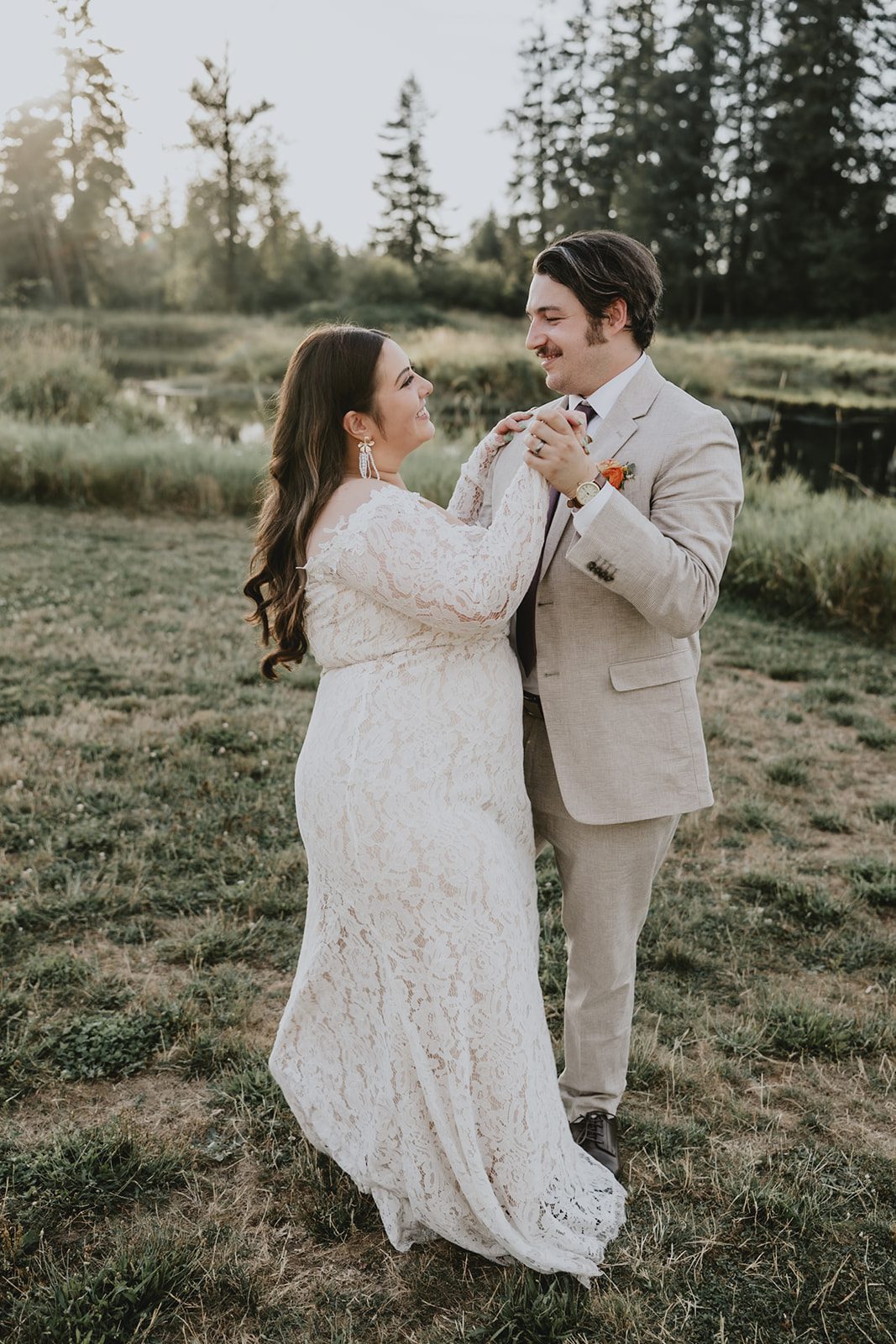 Bride and groom in the field