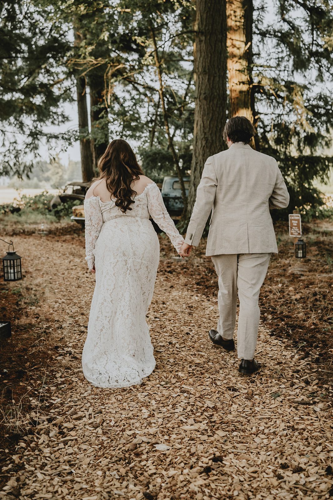 Couple walking on the forest path at Brightwater