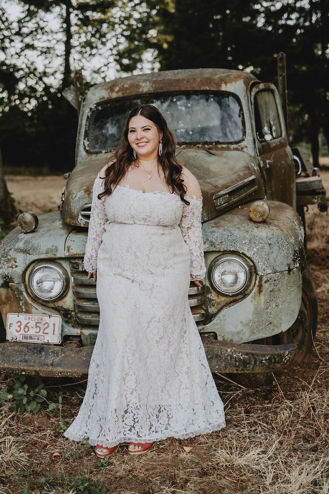 Bride by the vintage truck