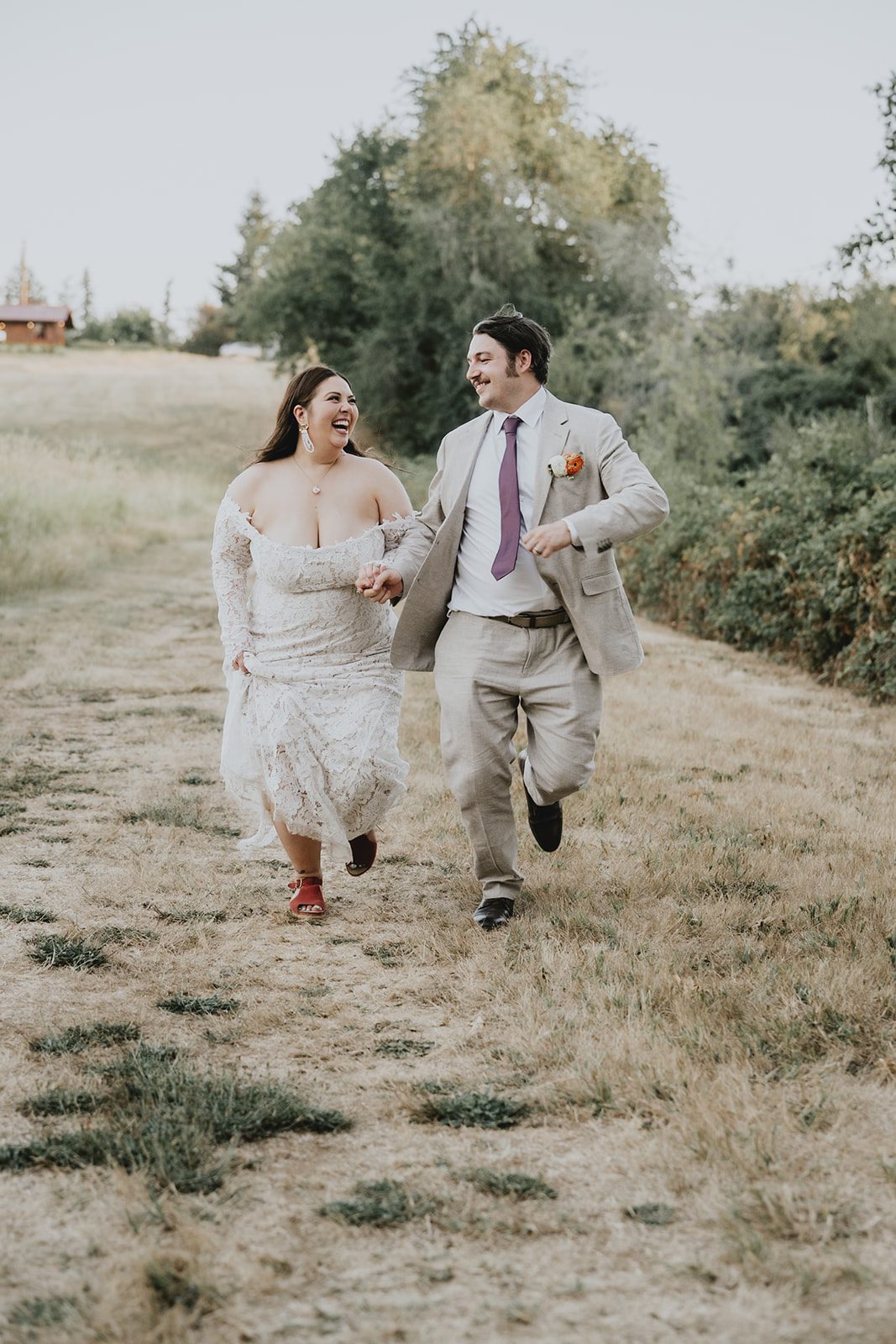 Newlyweds walking hand in hand