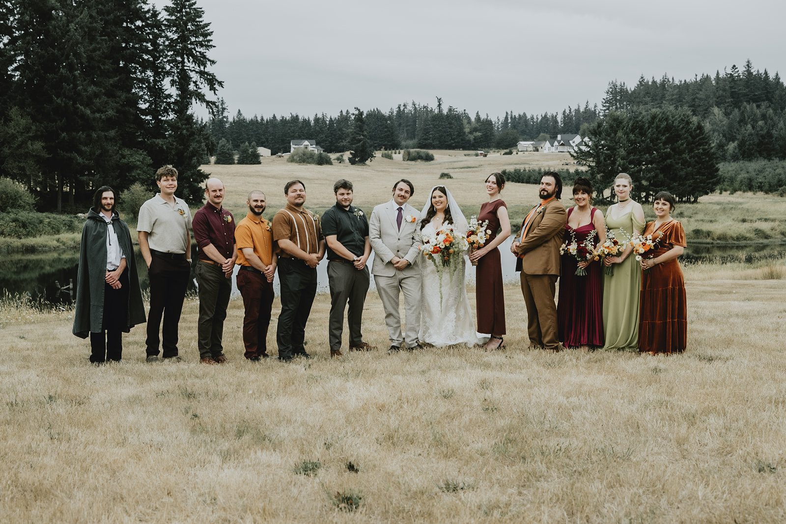 Full wedding party in the field at Brightwater Weddings & Events