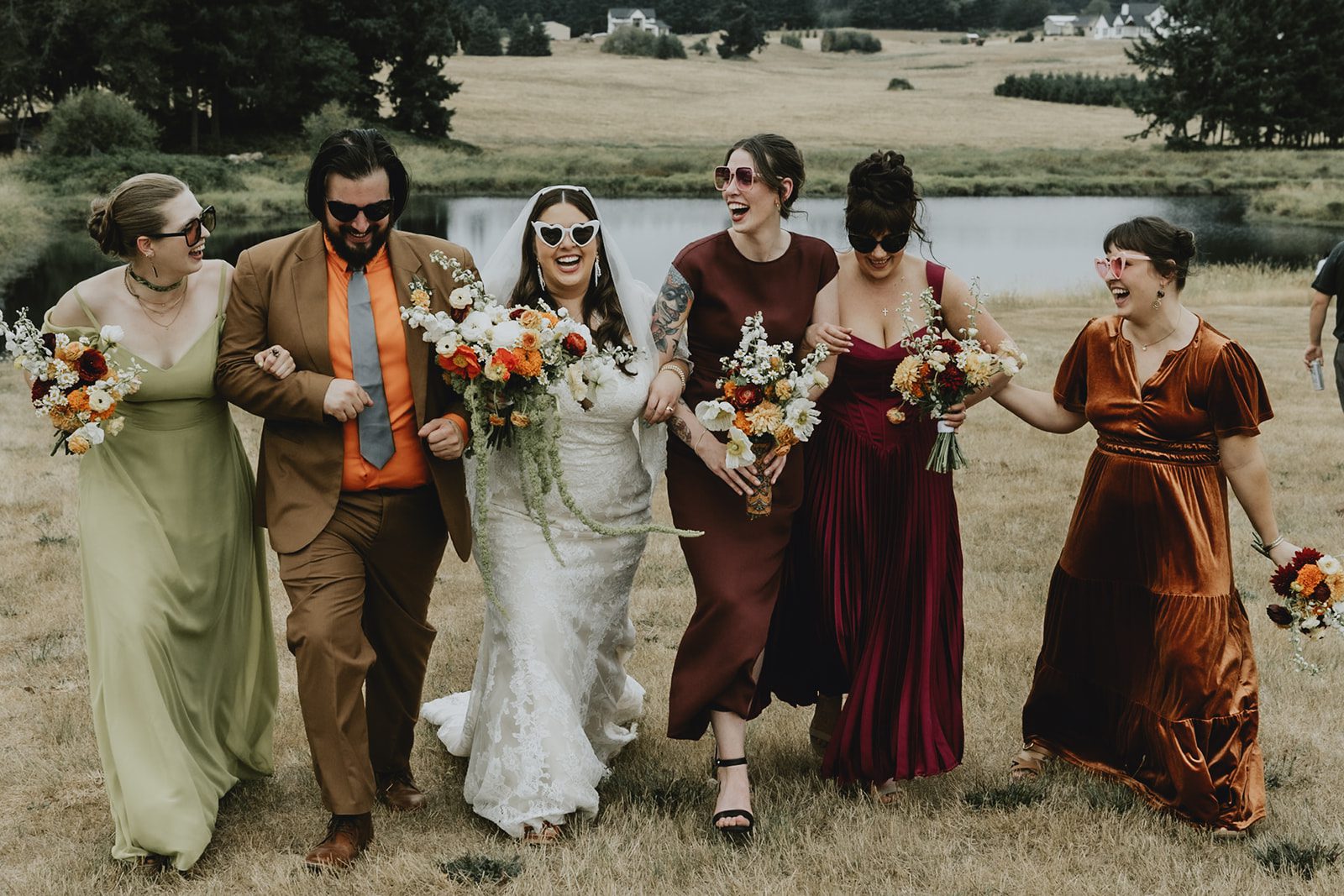 Bridesmaids cheering for the couple