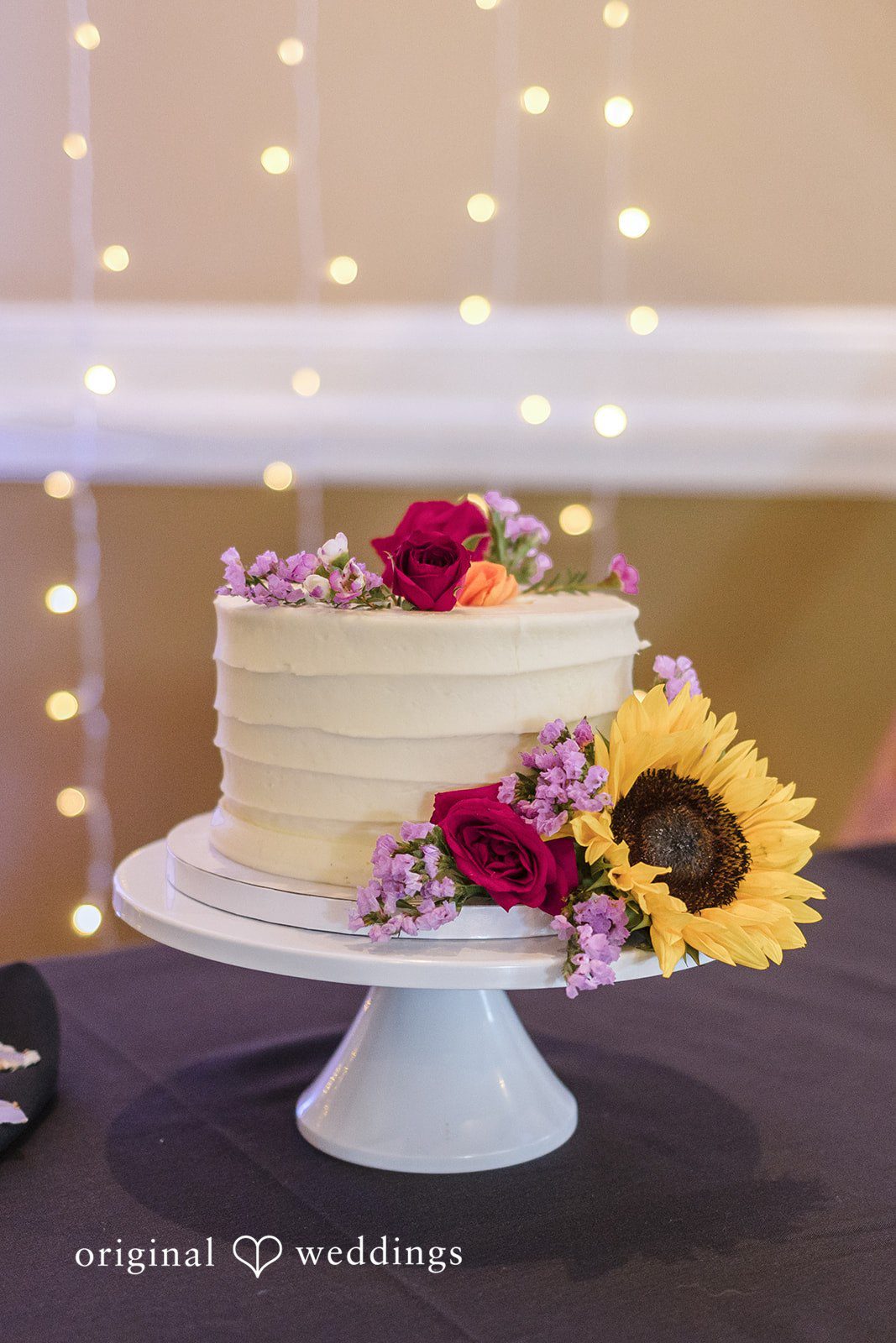 Jessica + James Cake adorned with florals