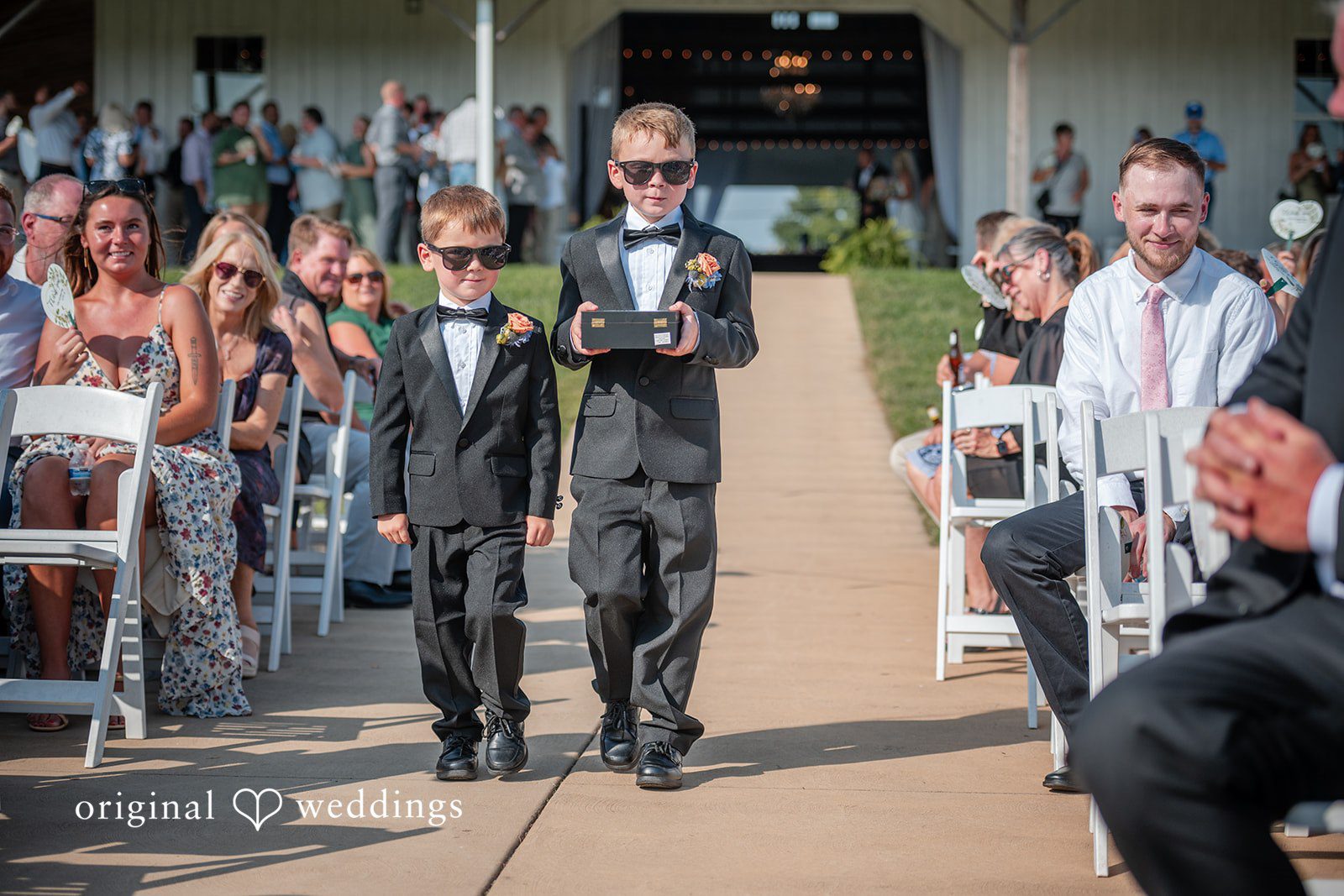 Wedding party walking back up the aisle