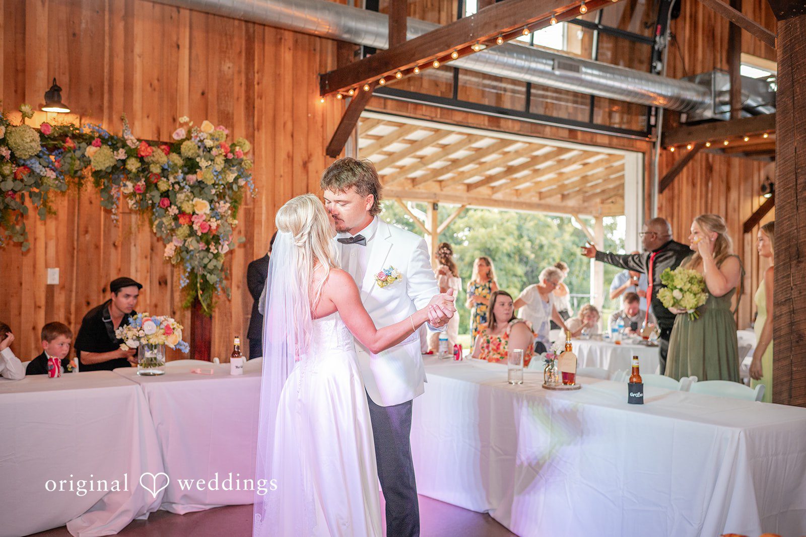 Couple celebrating at the reception at Bryton Barn