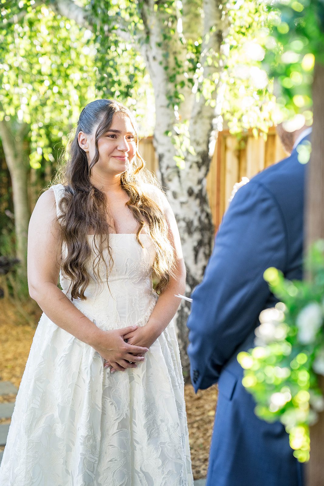 Bride smiling during the ceremony