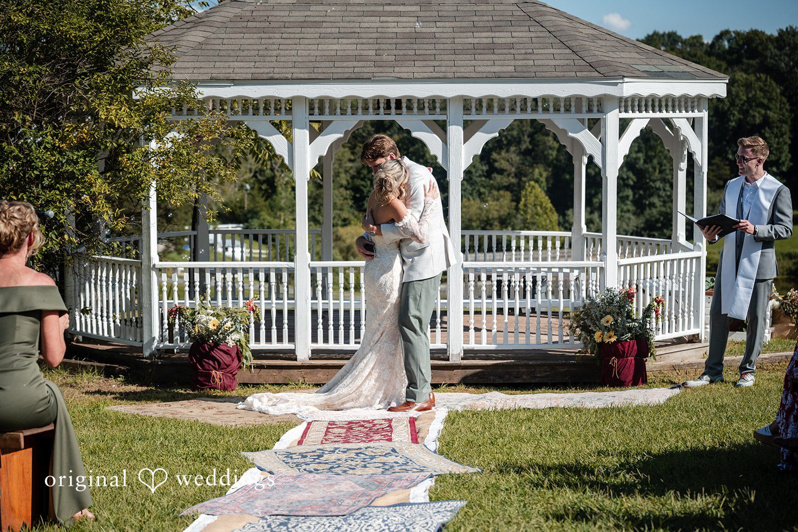 Bride walking toward the gazebo at Camp Kweebec