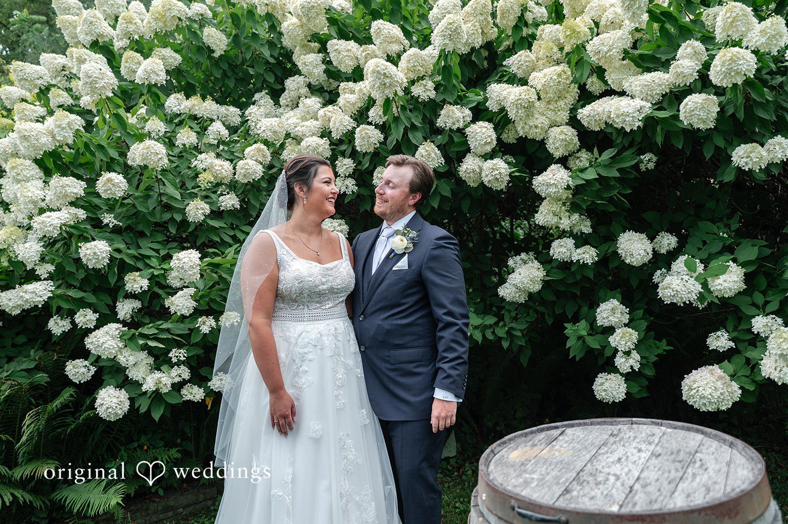 Our Minneapolis wedding photographers captured a portrait of the groom by the garden