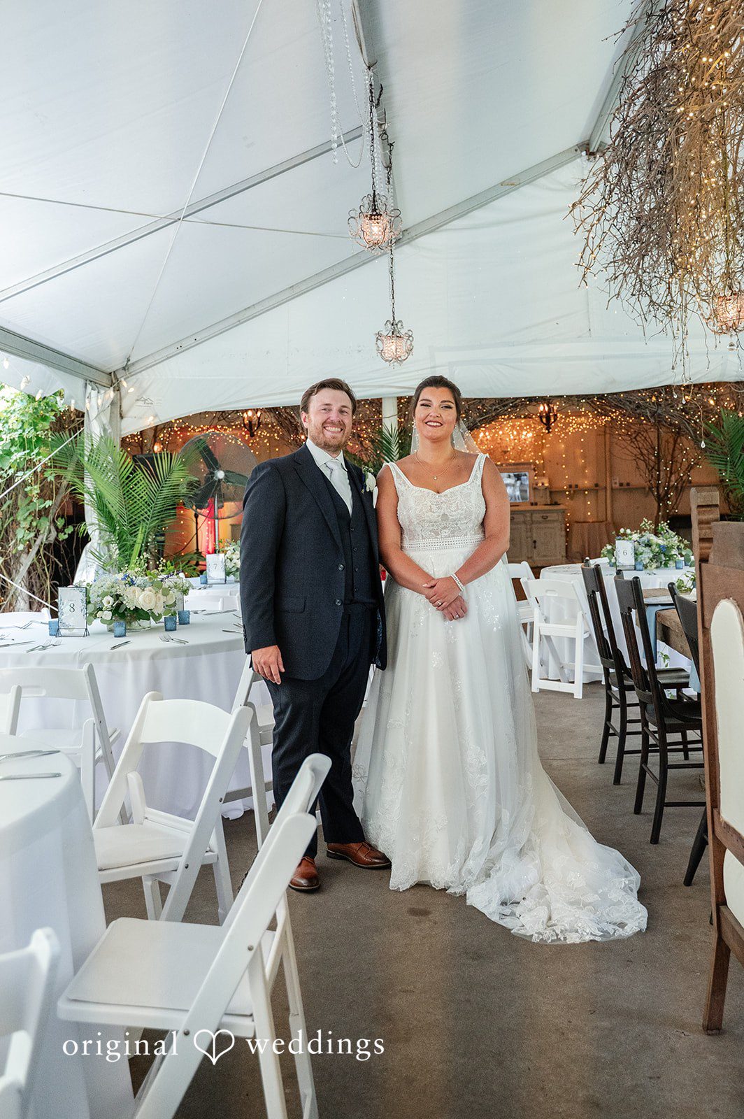 Portrait at the wedding reception tent
