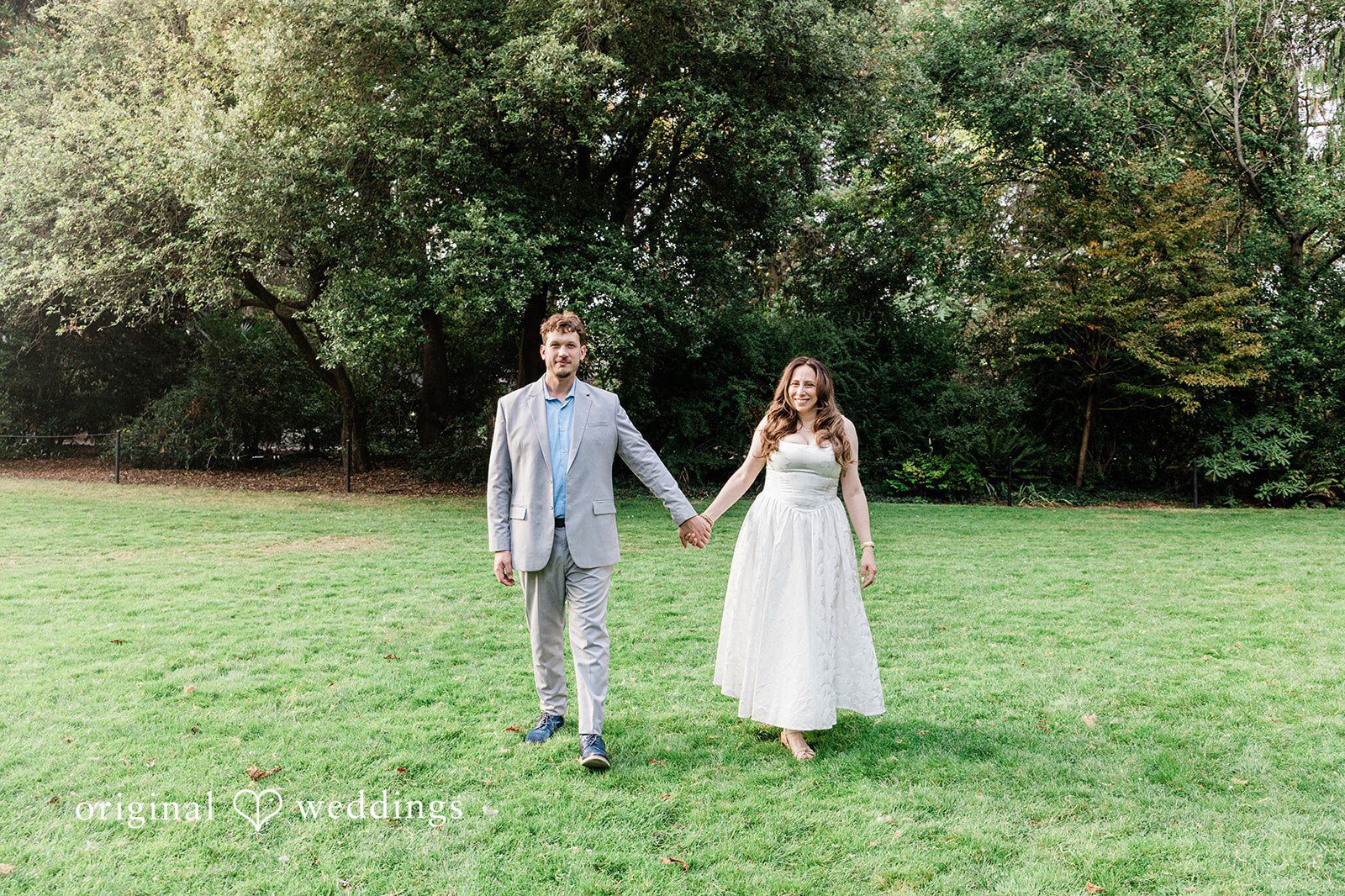 Our Seattle engagement photographers at Original Weddings captured the couple taking a walk through the field at Carl S. English Jr. Botanical Garden