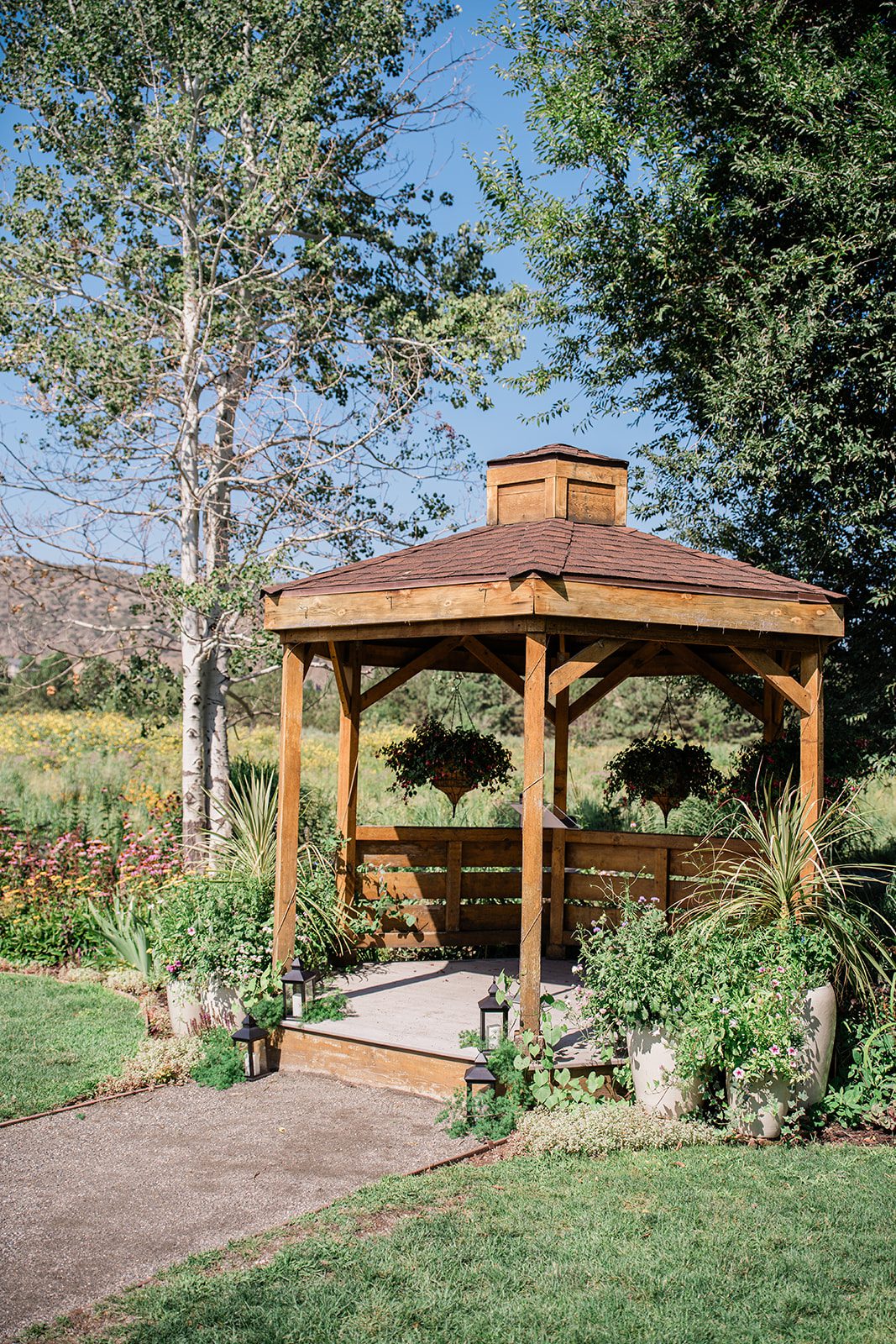 chatfield-farms-airy-denver-june-logan-002-27 Wooden gazebo ceremony site at Chatfield Farms