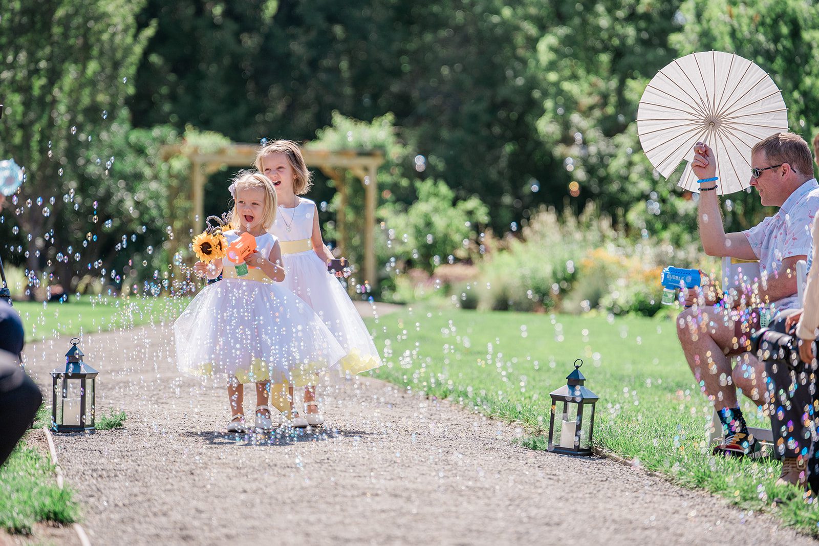 chatfield-farms-airy-denver-june-logan-009-16 Flower girl walking down the garden aisle