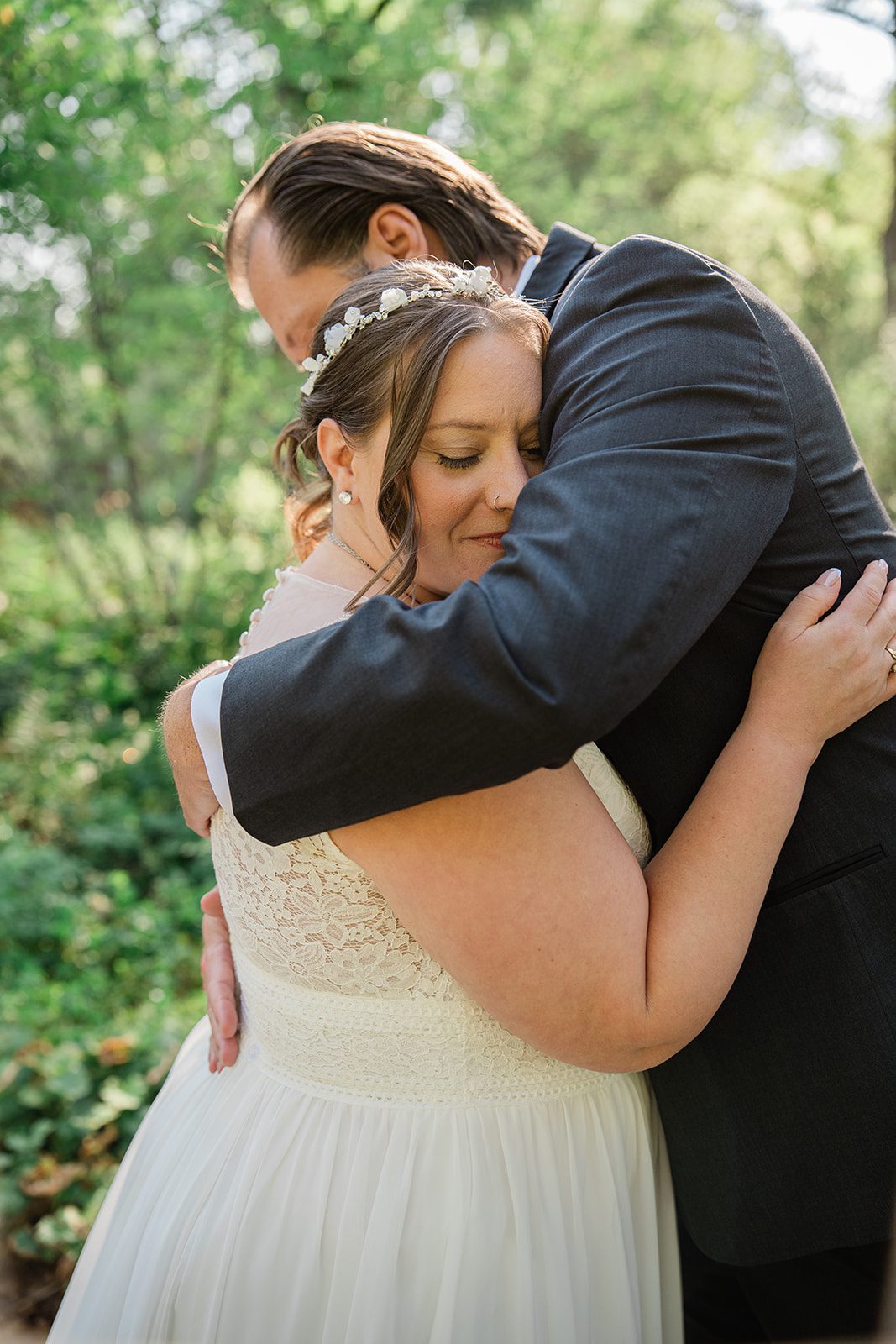 chatfield-farms-airy-denver-june-logan-017-04 Bride and groom hugging after the first look