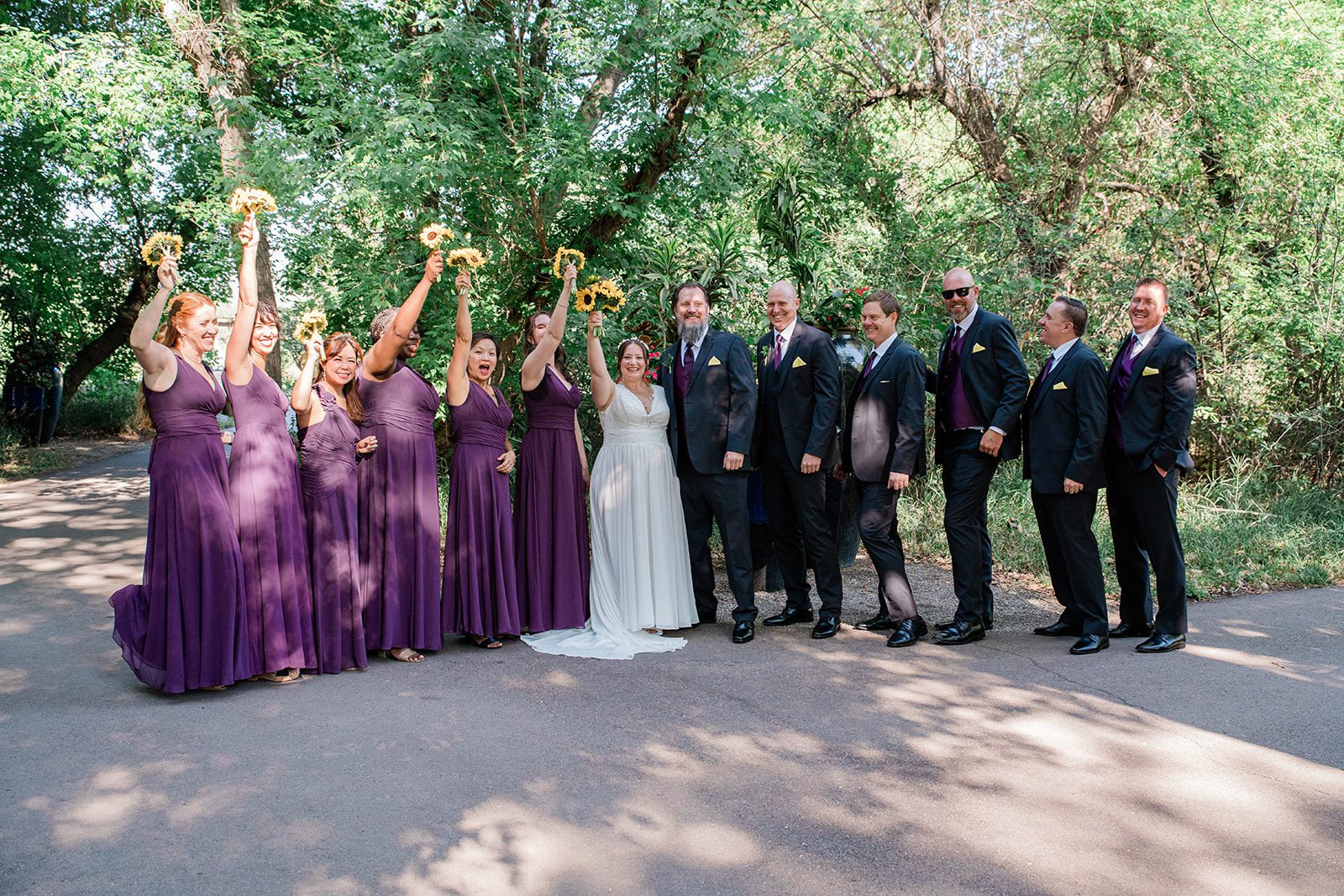 chatfield-farms-airy-denver-june-logan-024-14 Wedding party cheering with the newlyweds