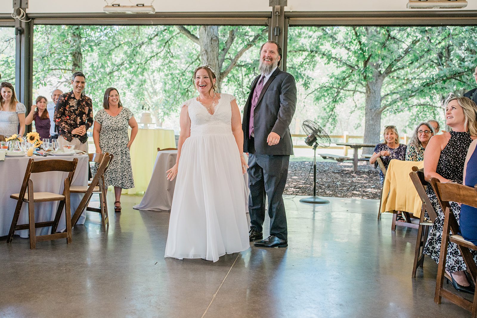 chatfield-farms-airy-denver-june-logan-026-30 Couple making their entrance into the reception
