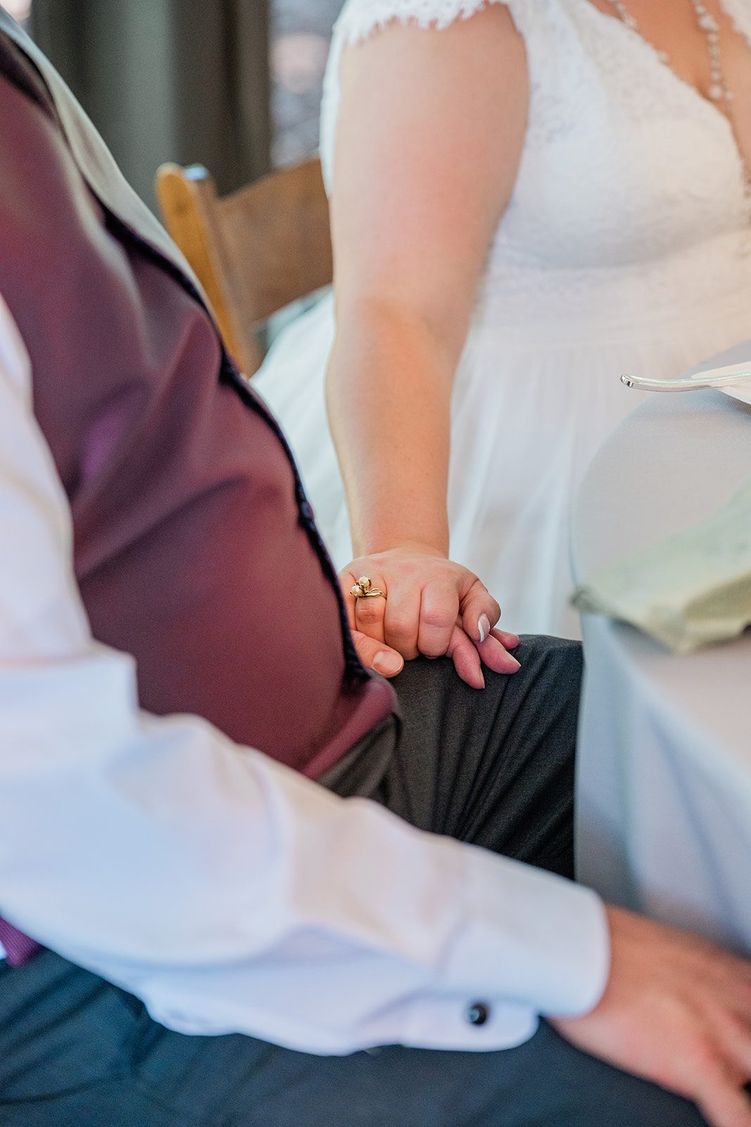 chatfield-farms-airy-denver-june-logan-029-23 Close up of the couple holding hands