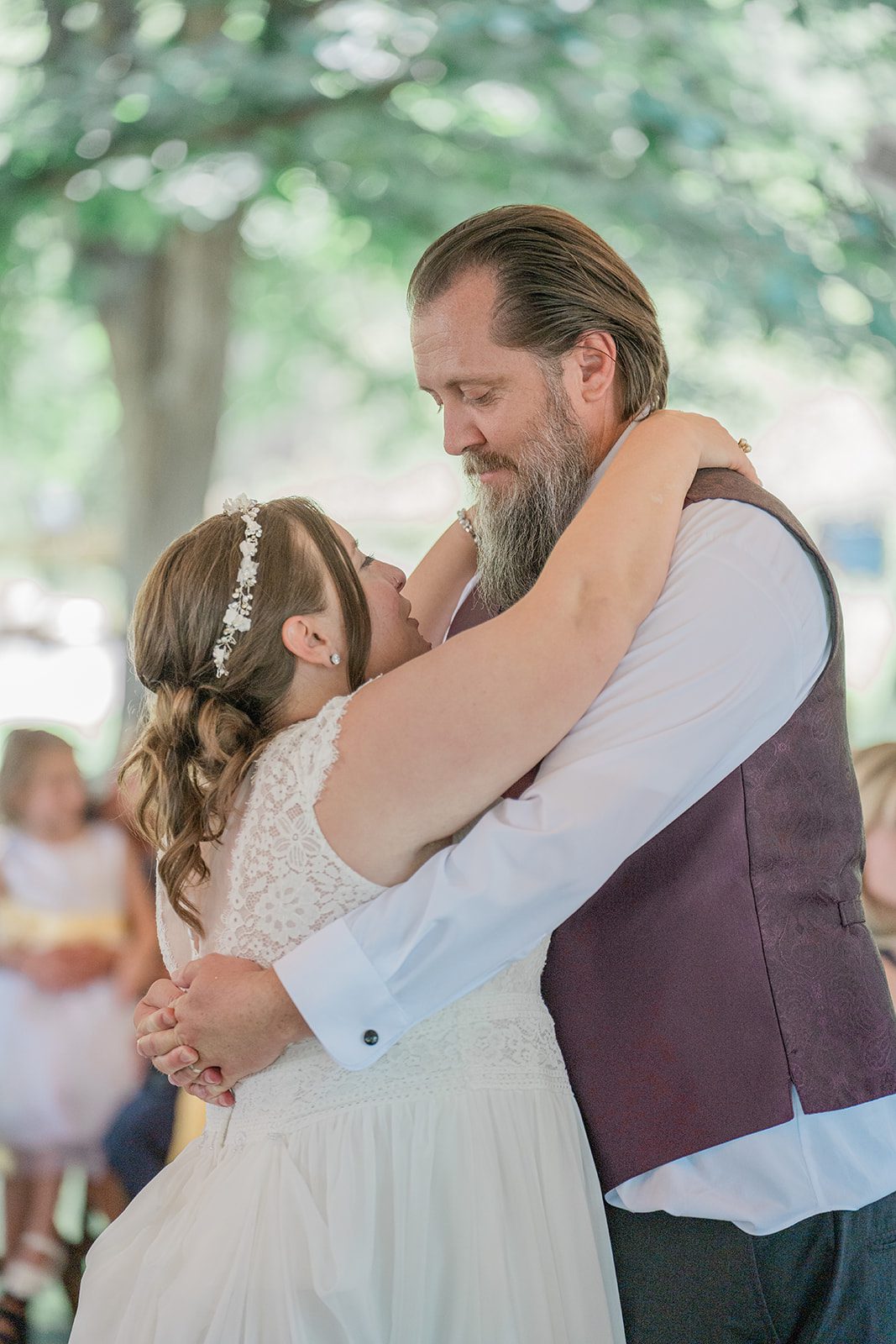 chatfield-farms-airy-denver-june-logan-030-28 Couple sharing a hug on the dance floor