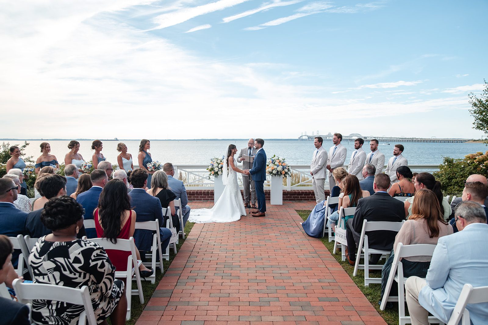 chesapeake-bay-beach-club-timeless-baltimore-kelsey-tom-017-02 Bride walking down the aisle