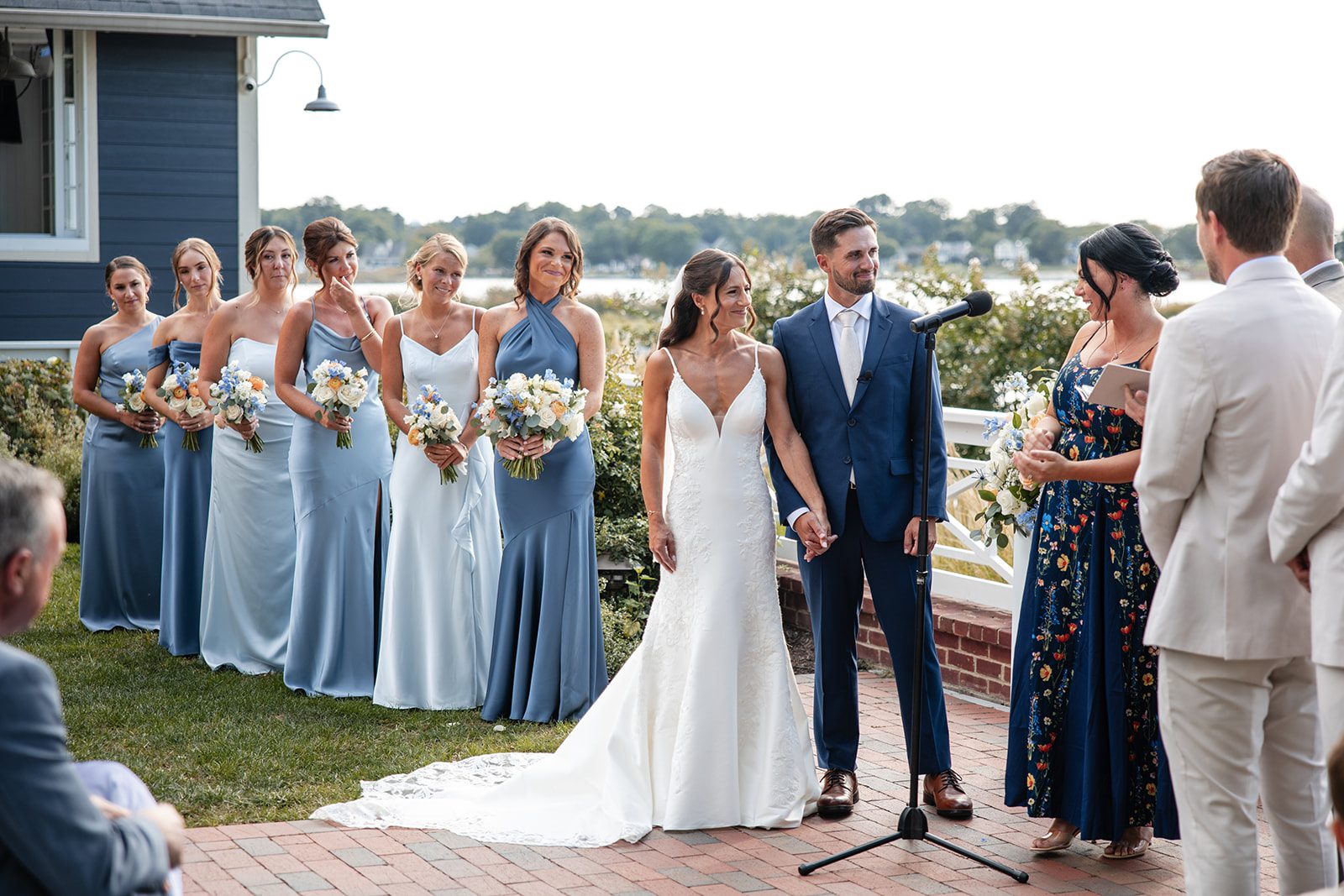 chesapeake-bay-beach-club-timeless-baltimore-kelsey-tom-019-01 Couple with their wedding party at the ceremony