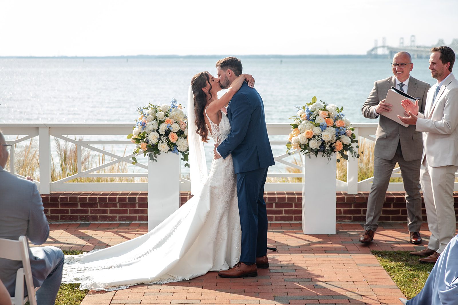 chesapeake-bay-beach-club-timeless-baltimore-kelsey-tom-022-06 First kiss as a married couple
