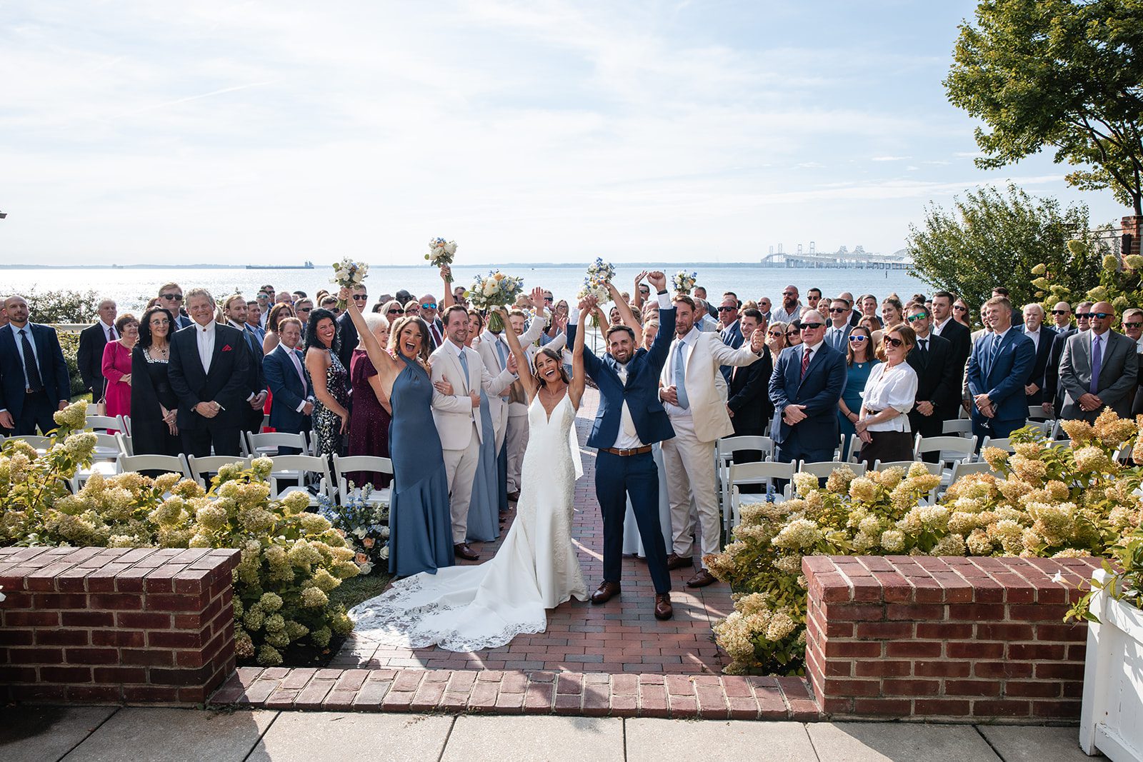 chesapeake-bay-beach-club-timeless-baltimore-kelsey-tom-023-19 Wide view of the ceremony and guests at Chesapeake Bay Beach Club
