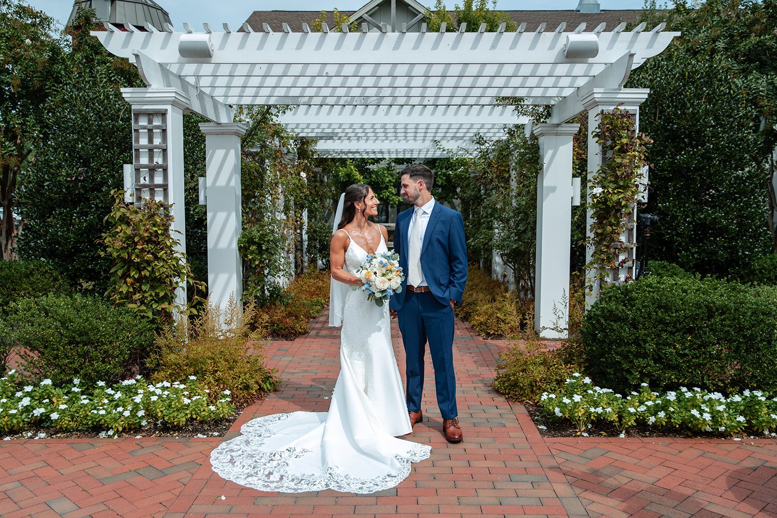 chesapeake-bay-beach-club-timeless-baltimore-kelsey-tom-031-34 Bride and groom by the pergola