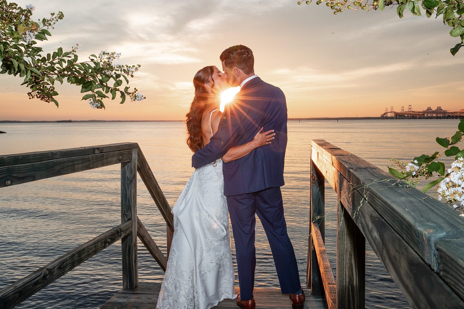 chesapeake-bay-beach-club-timeless-baltimore-kelsey-tom-036-35 Bride and groom silhouetted at sunset