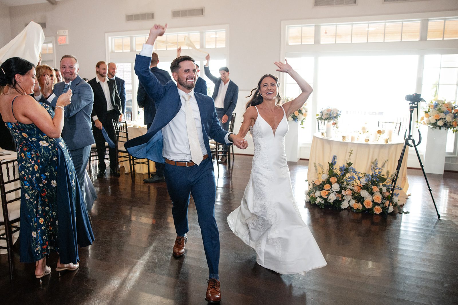 chesapeake-bay-beach-club-timeless-baltimore-kelsey-tom-042-47 Newlyweds making their reception entrance