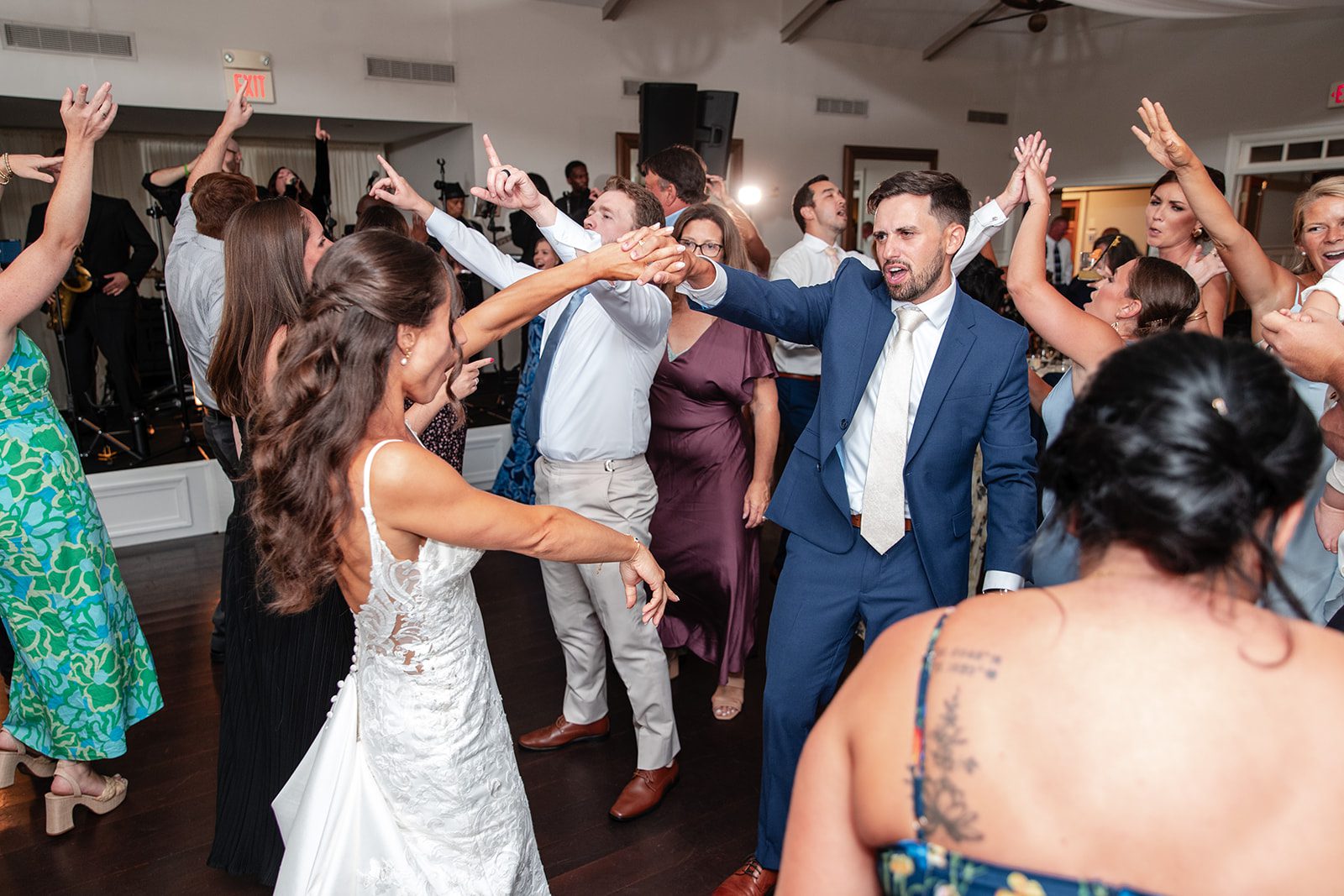 chesapeake-bay-beach-club-timeless-baltimore-kelsey-tom-050-07 Guests dancing with the newlyweds