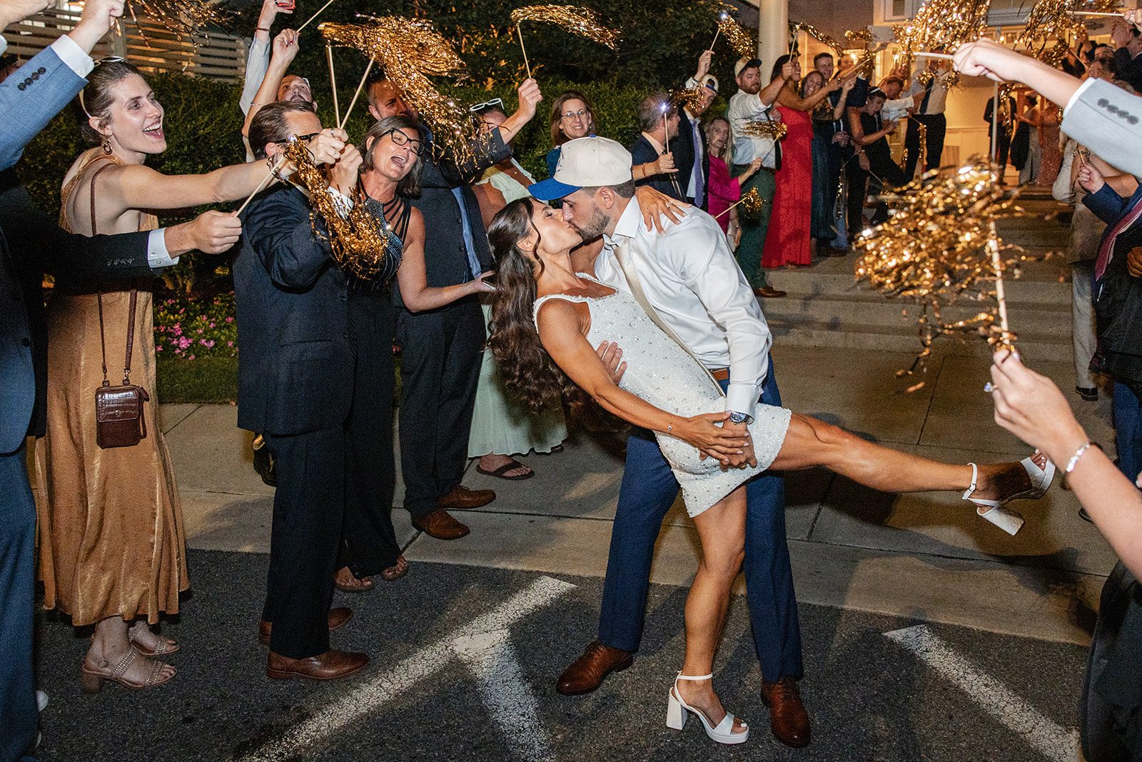 chesapeake-bay-beach-club-timeless-baltimore-kelsey-tom-060-46 Couple running through the sparkler exit
