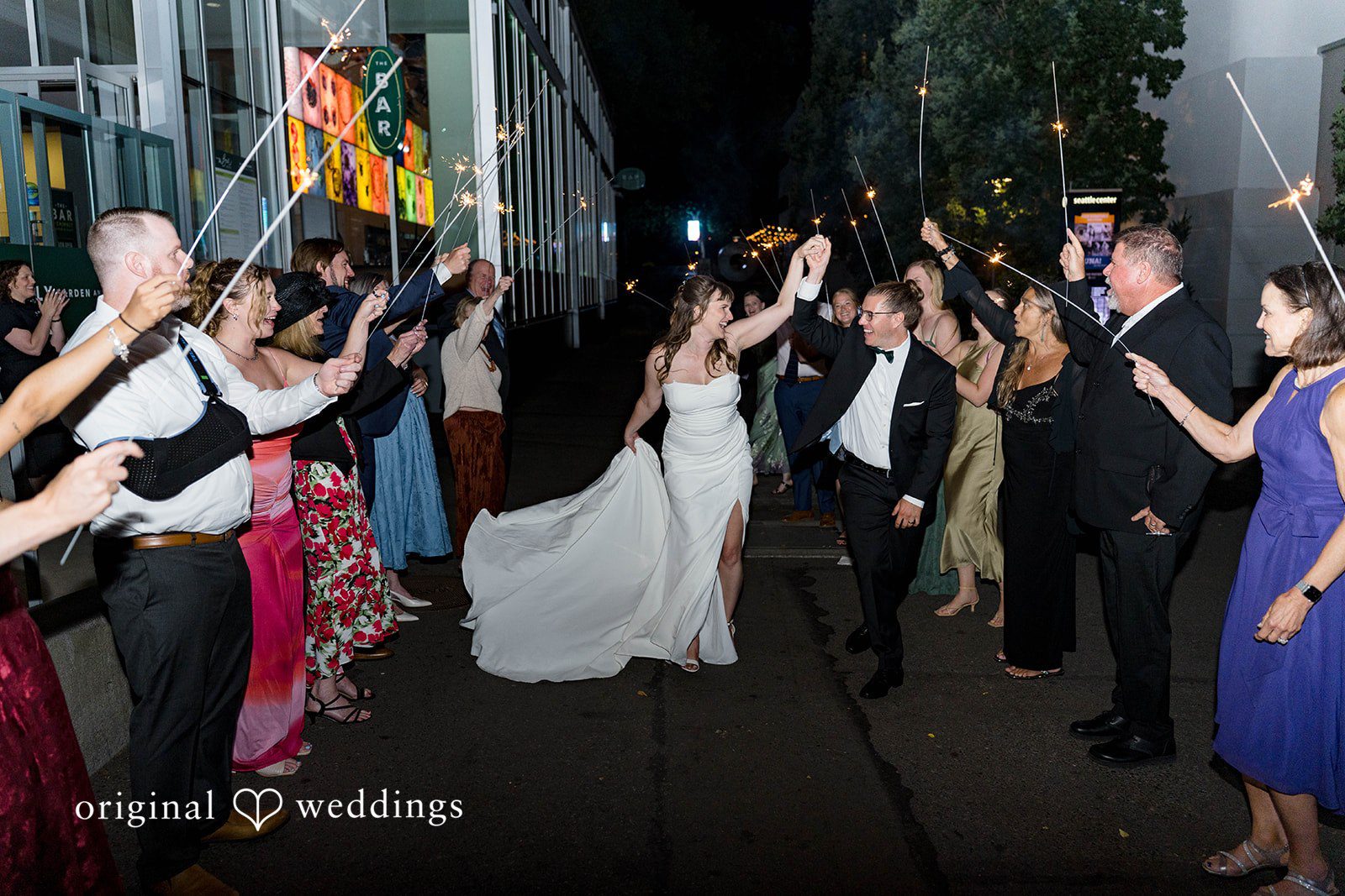 David + Lauren The couple makes a joyful exit with cheers from guests