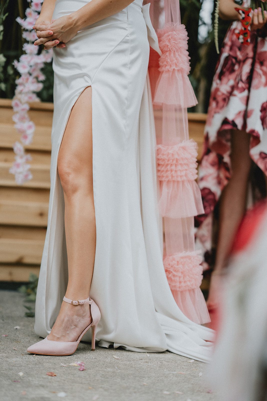 Bride's gown and heels as she walks down the aisle