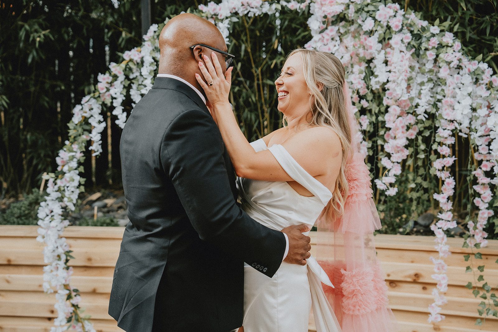 Bride and groom embracing after the kiss