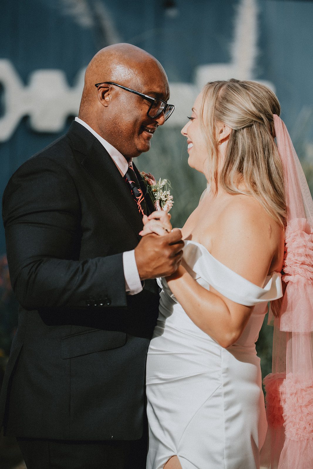 Groom and bride slow dancing