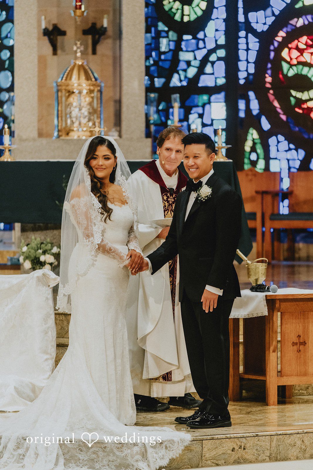 Sonia + Michael Sonia and Michael exchanging vows at the altar