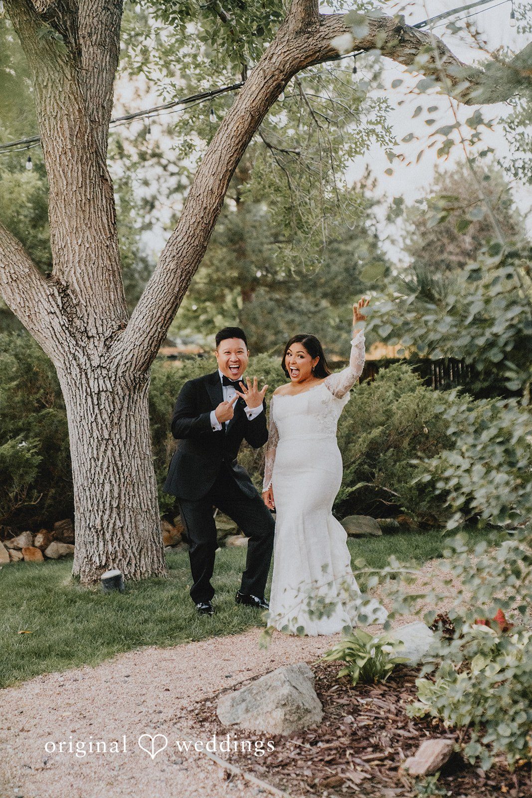 Sonia + Michael Couple sharing a moment under a large shade tree