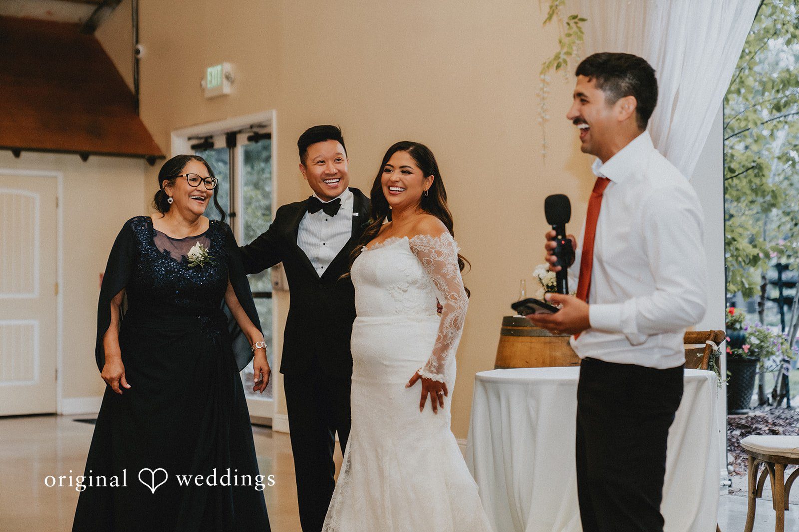 Sonia + Michael Family group photo with the newlyweds at Church Ranch Event Center