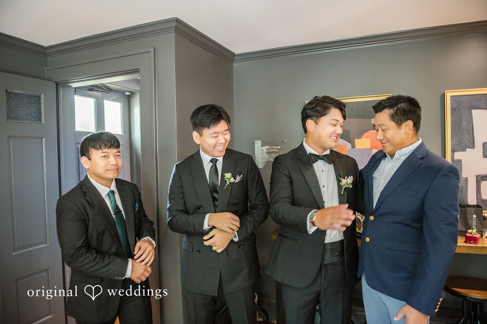 Yuri + Zachary Groom laughing with his groomsmen