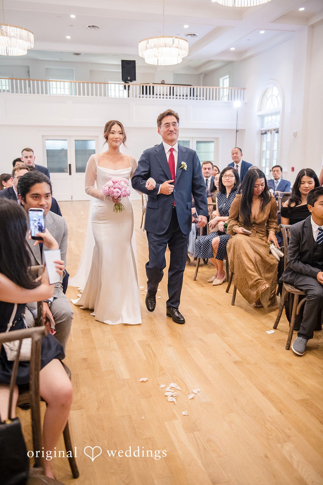 Yuri + Zachary Guests seated for the indoor ceremony at Collier Hall