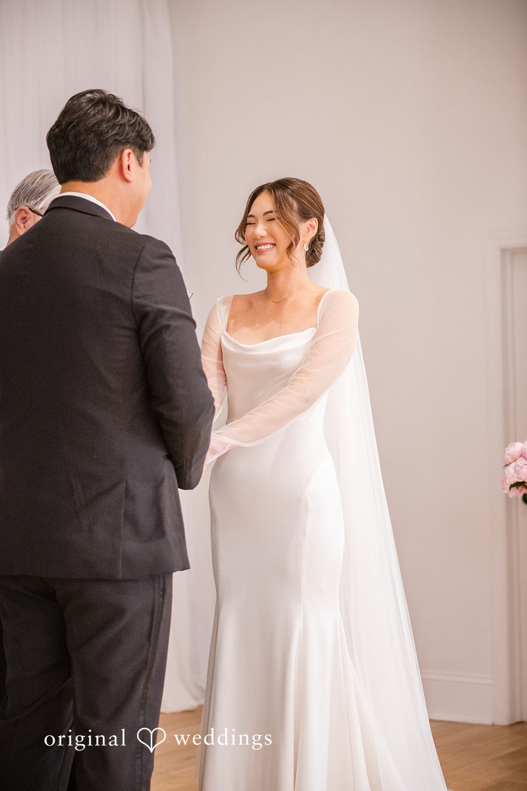 Yuri + Zachary Bride and groom portrait in the hall at Collier Hall
