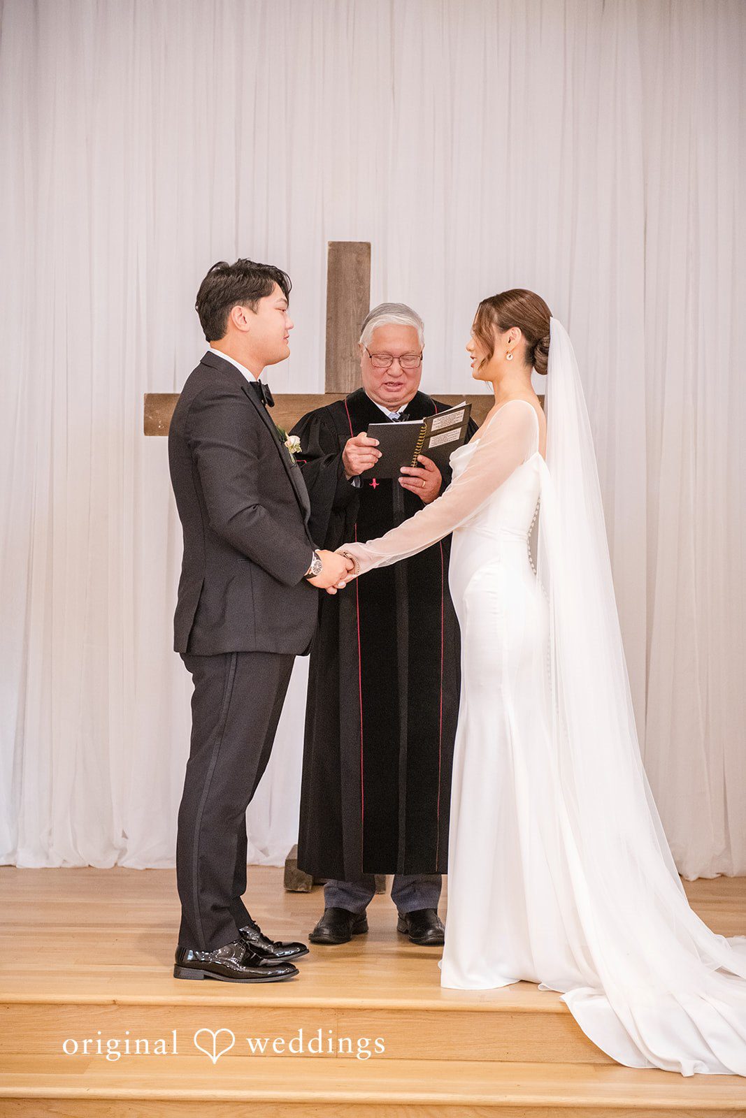 Yuri + Zachary Couple saying their vows