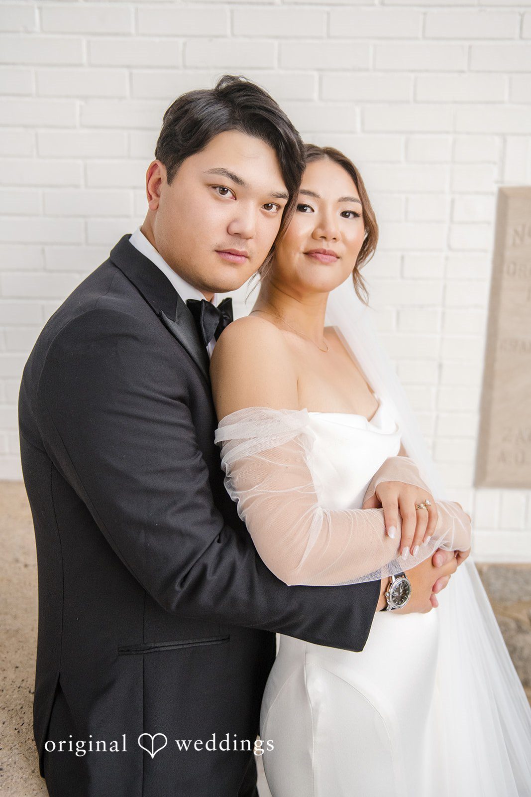 Yuri + Zachary Groom and bride smiling together