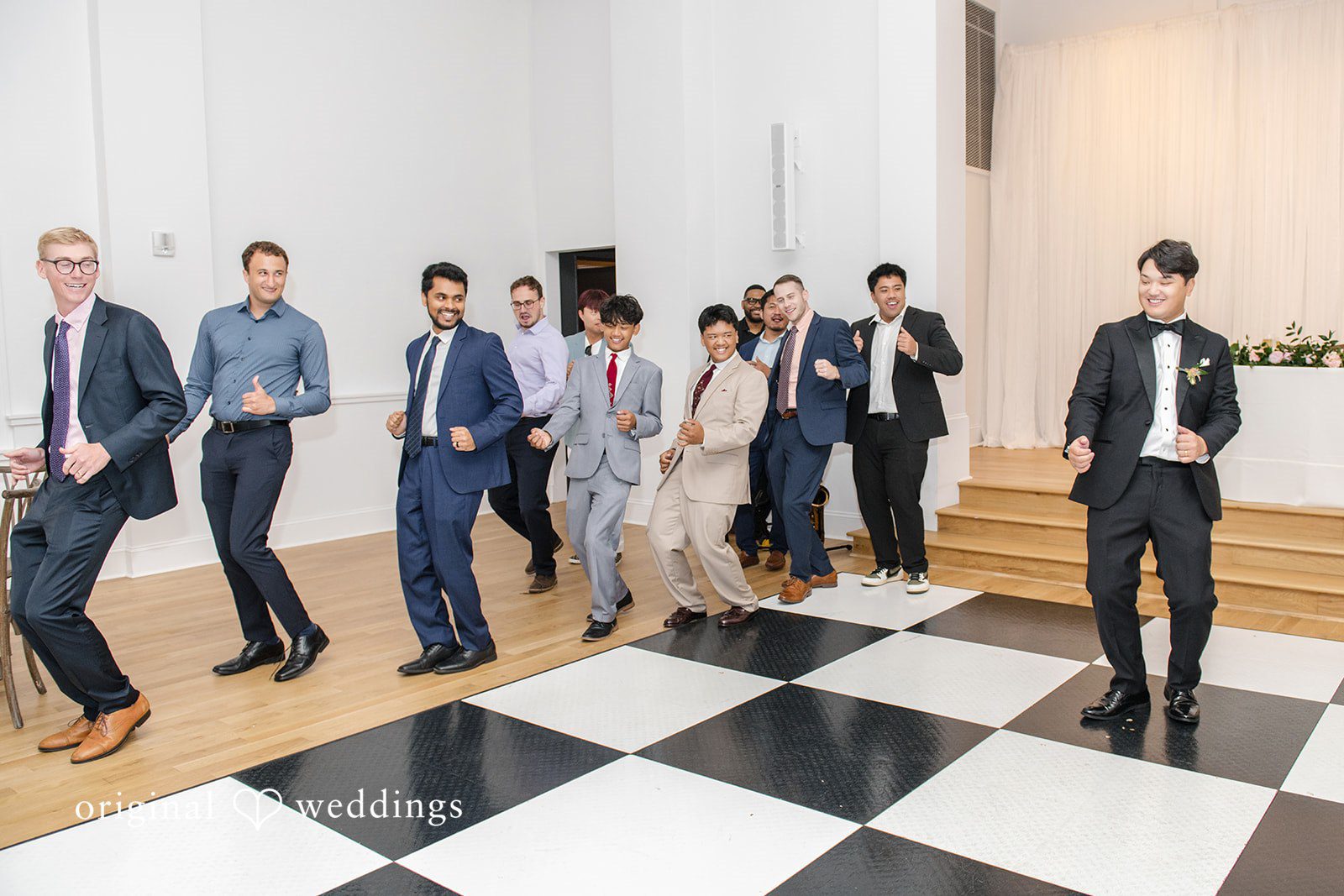 Yuri + Zachary Guests dancing on the checkered floor