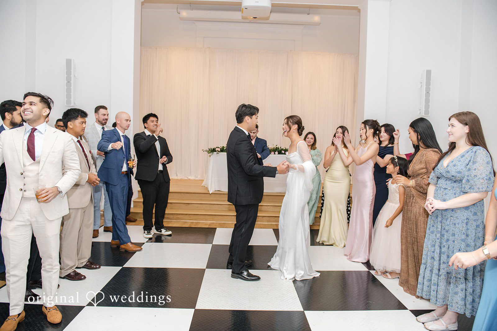 Yuri + Zachary Full wedding party on the checkered floor at Collier Hall