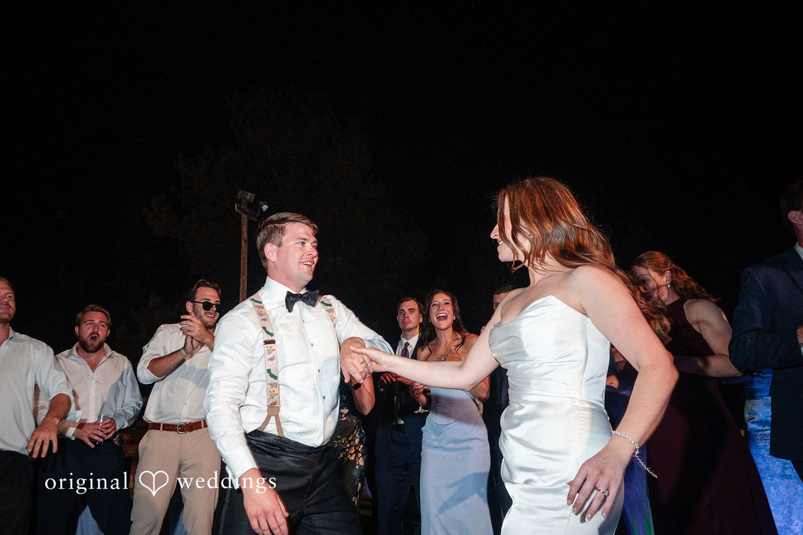 Erin + John Bride and groom dancing at the Colorado backyard wedding reception