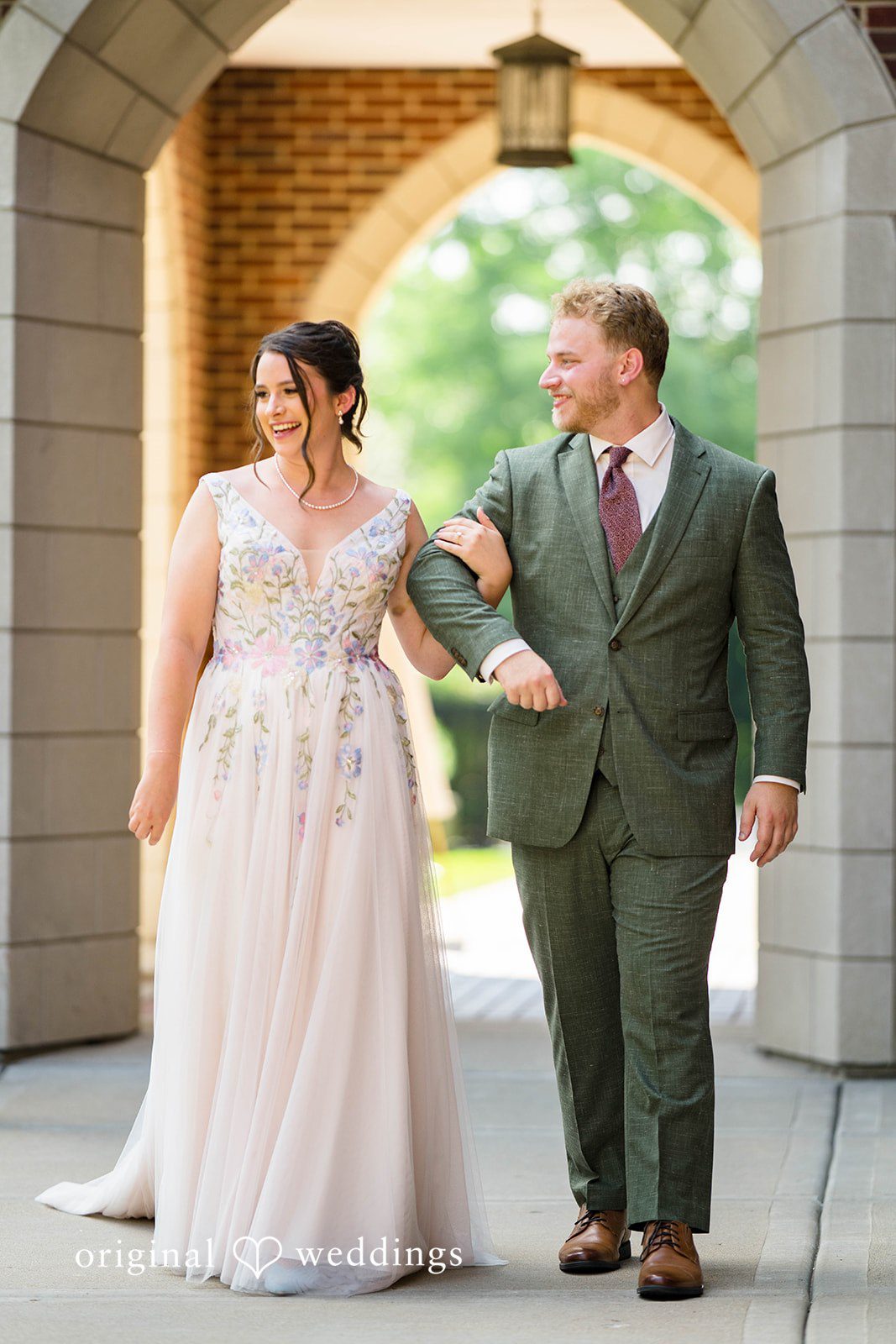 Griffin + Lauren Couple posing in the archway