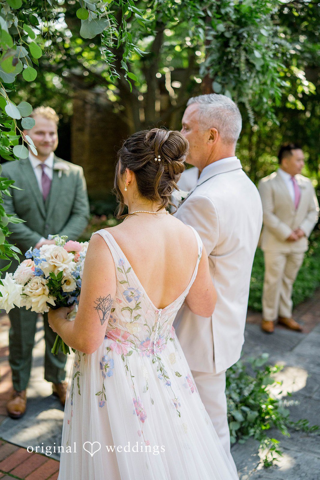 Griffin + Lauren Bride walking toward the ceremony
