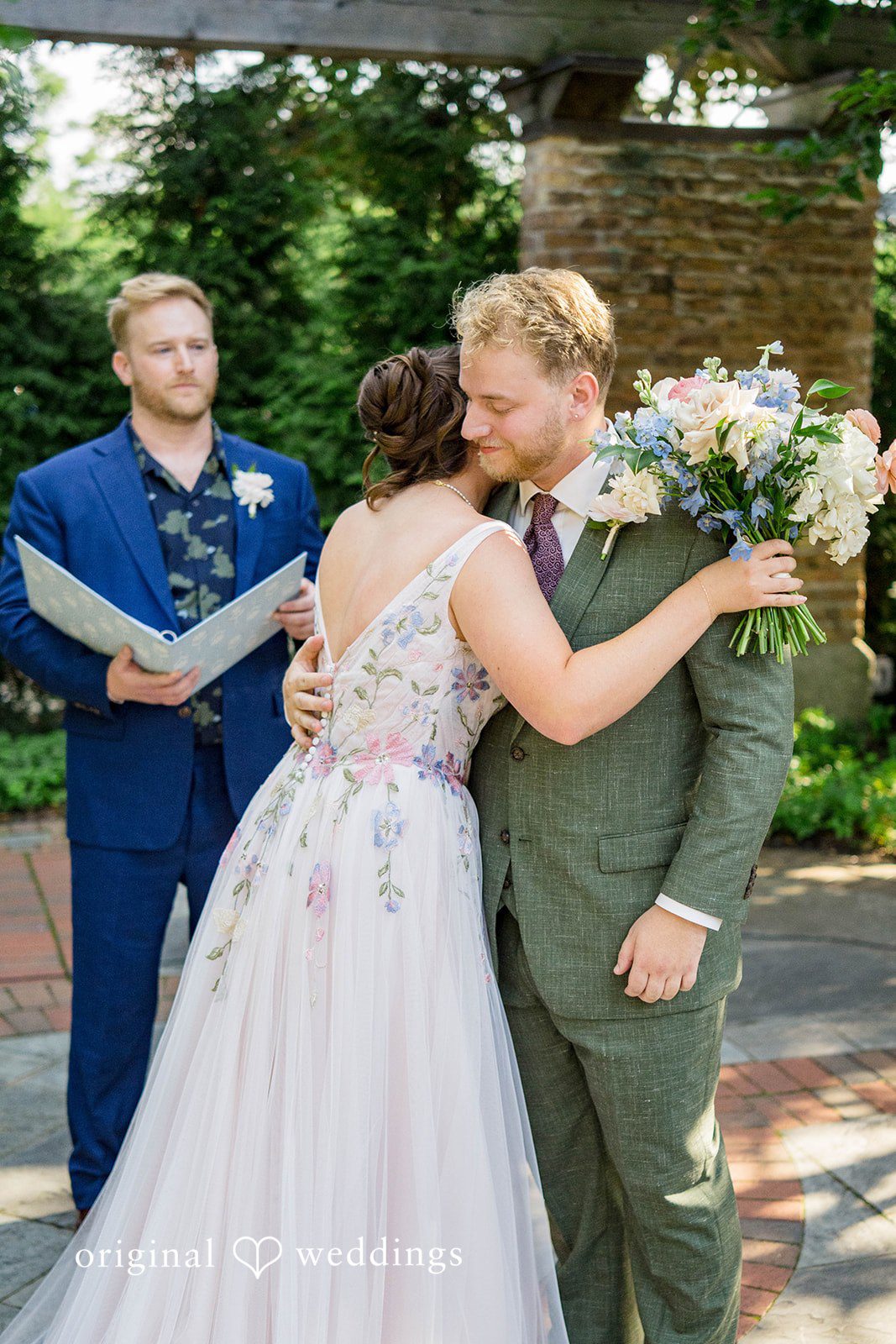 Griffin + Lauren Couple hugging after the ceremony