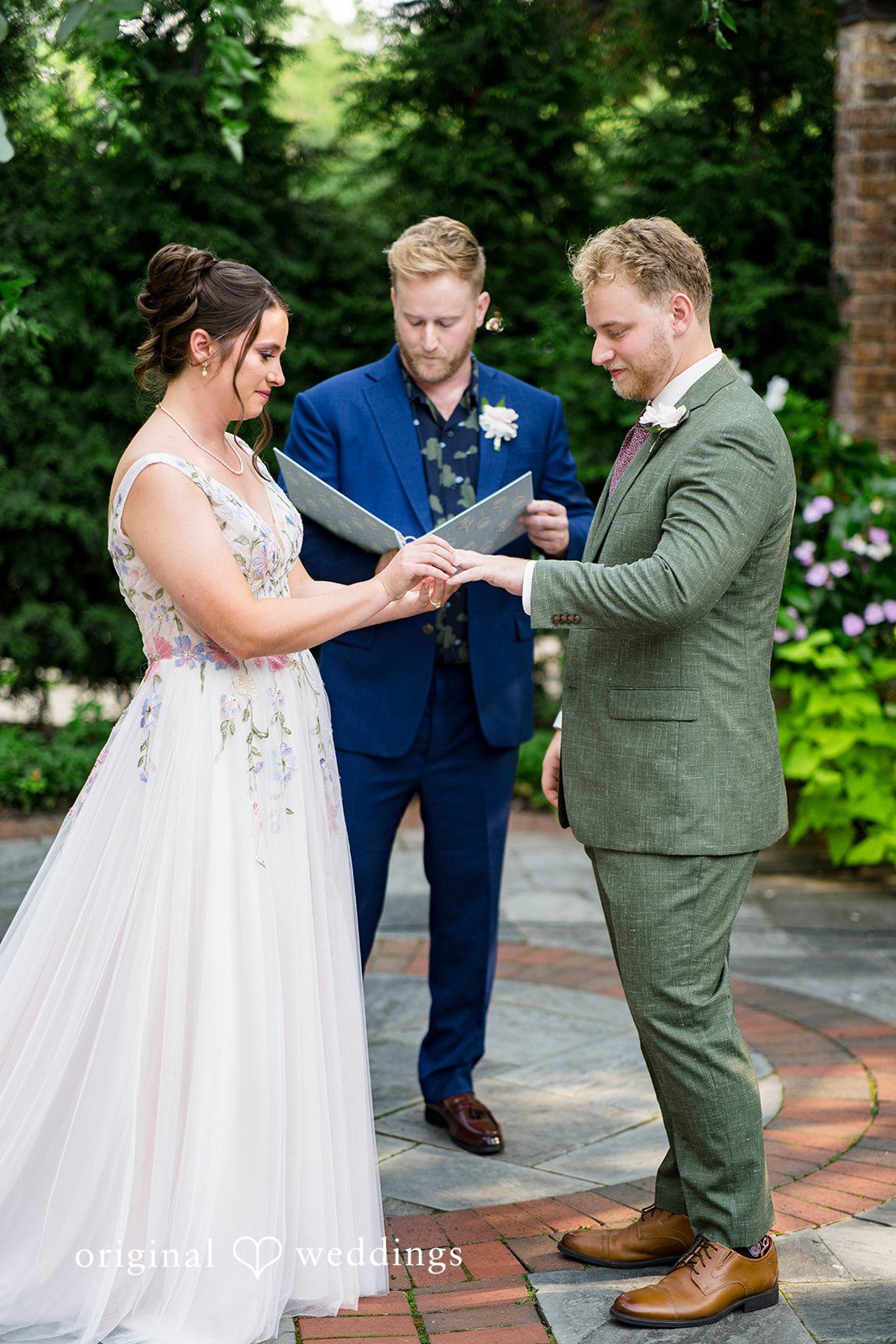 Griffin + Lauren Couple with the officiant during the ceremony